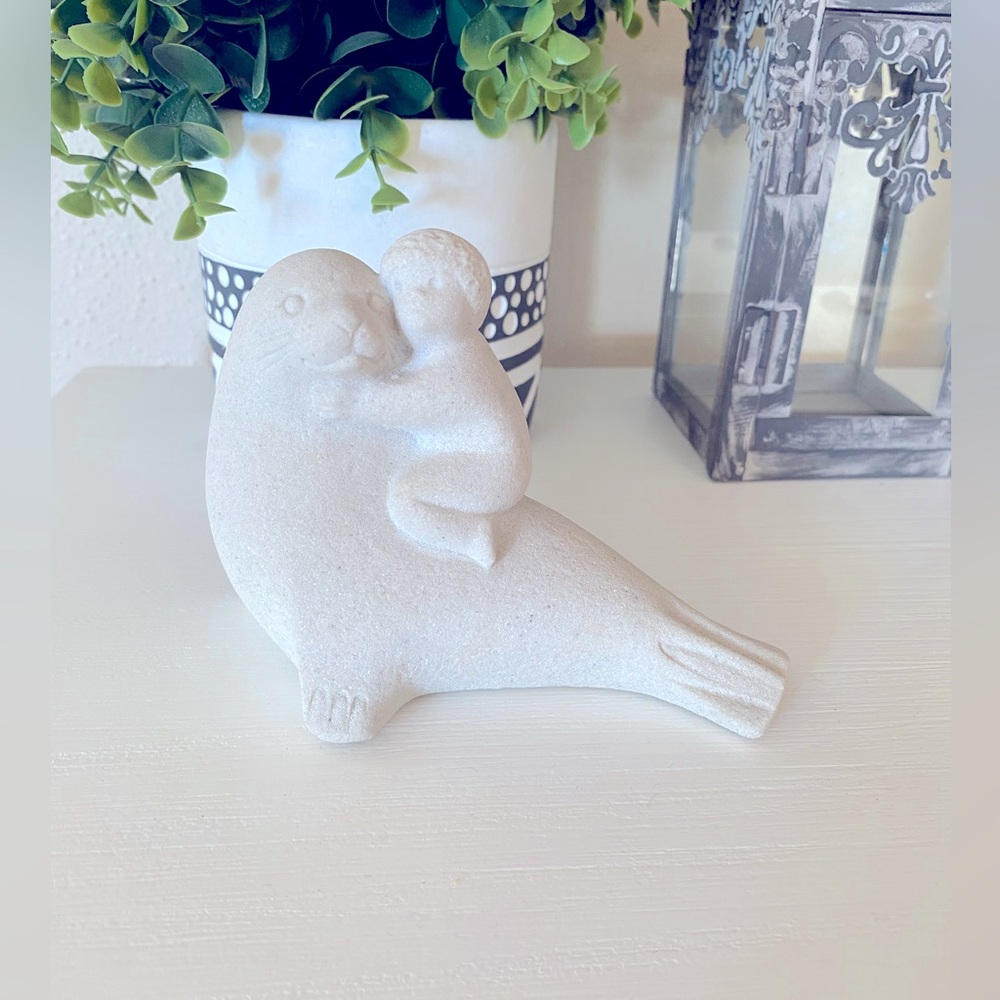 Marbell Stone Art Belgium Sandstone Figurine - Child with Sea Lion Seal Figurine